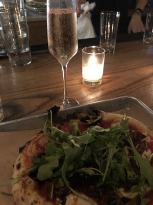 Sparkling Rose and Eggplant Bacon Pizza at the bar. Yummmmm at Double Zero in New York City