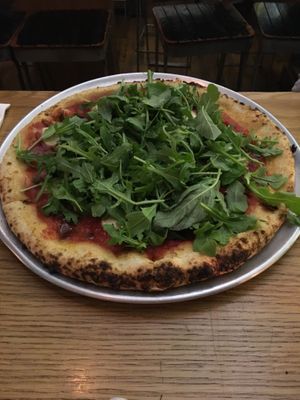 Pepperoni pizza with greens at Double Zero in New York City