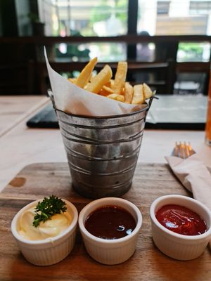 Fries with a selection of dips. at Veganerie Concept - Benjasiri Park in Bangkok