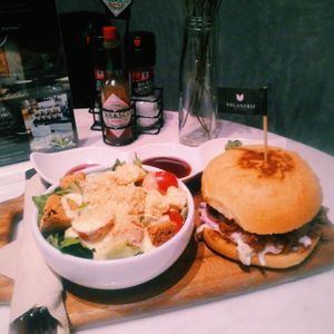 Signature burger and vegan salad. at Veganerie Concept - Benjasiri Park in Bangkok