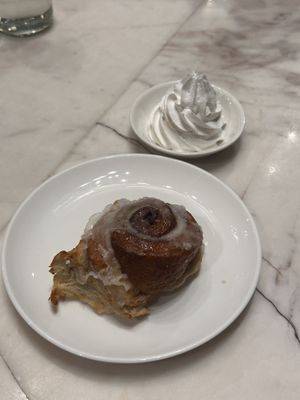 Cinnamon roll with extra whipped cream   at Veganerie Concept - Benjasiri Park in Bangkok