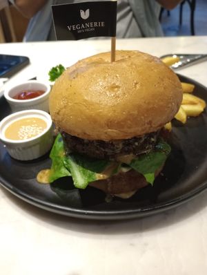 Plant Power Teriyaki Burger - One of the best burgers I've ever had. Patty made from almonds, shitake and red beans. The grilled pineapple 🫶🏽 at Veganerie Concept - Benjasiri Park in Bangkok