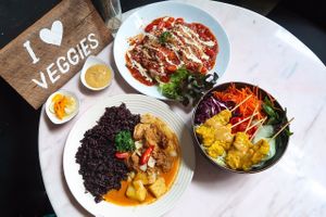 Massamam curry(left. Not really a curry) Italian crepe(top. best warm food I had there)tofu satay veggie noodle salad(right. Big and good satay sauce) at Veganerie Concept - Benjasiri Park in Bangkok