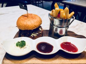 Pulled pork mushroom burger with fries at Veganerie Concept - Benjasiri Park in Bangkok