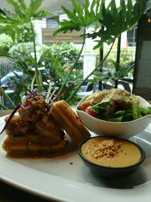 waffles and fried "chicken" made from mushroom + Caesar salad at Veganerie Concept - Benjasiri Park in Bangkok