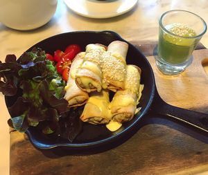 Baked Spring Rolls with Pesto Sauce at Veganerie Concept - Benjasiri Park in Bangkok