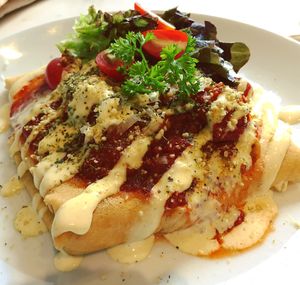 Italian Crêpe & Pizza Sauce with fake sausages & fake cheeses at Veganerie Concept - Benjasiri Park in Bangkok