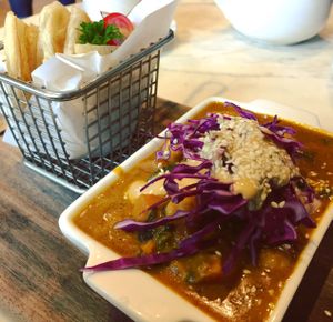 Sweet potato, chickpea, spinach & coconut curry with baked roti at Veganerie Concept - Benjasiri Park in Bangkok
