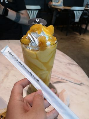 Mango smoothie & bio degradable straws! at Veganerie Concept - Benjasiri Park in Bangkok