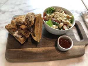 Chicken and waffles with Caesar salad at Veganerie Concept - Benjasiri Park in Bangkok