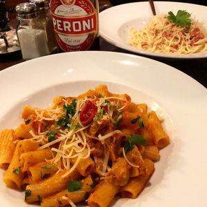 Vegan arrabbiatta and carbonara. (And Peroni beer IS vegan).  at Feca in Stockholm