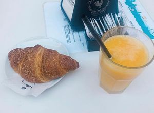 Croissant and juice  at MiaGola Caffe - Giovanni Amendola in Turin
