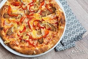 Tempeh pizza at Plantaz Bistro & LimeLight BAR in Martin