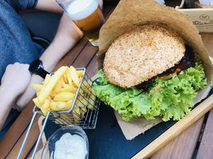 huge ‘beef’ burger with fries at Plantaz Bistro & LimeLight BAR in Martin