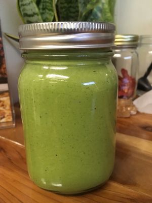 "Green House" dressing/marinade. It's like a salad in itself! Bursting with flavor!! A blend of fresh basil, kale, parsley, oregano, hemp hearts, lemon juice and himalayan salt. Served on our house salad or sold in 5 oz & 16 oz bottles. at Old Earth Pure Organic Food in St Petersburg