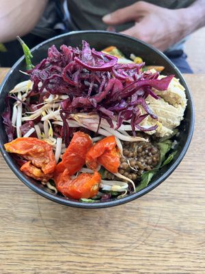 Asian-style vegan salad bowl. The sauce probably contains sugar, tastes quite sweet. This has a table spoon of everything - tb sp of lentils, tb sp of rice, corn etc.   at my indigo - Stainerstrasse in Innsbruck