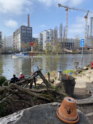 Sitting by the river  at The Green Market Berlin in Berlin