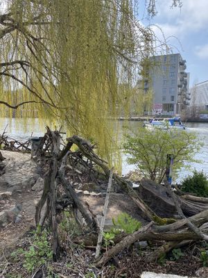 Sitting by the river  at The Green Market Berlin in Berlin