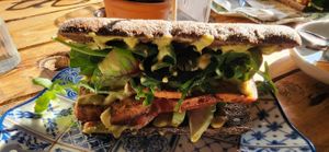 This was marinated tofu sandwich with curry cream sauce. at Kaffestuen Vesterbro in Copenhagen