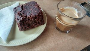 coffee with soy milk and vegan brownie at Kaffestuen Vesterbro in Copenhagen