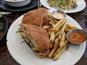 committed - BBQ mushroom sandwich on fermented ciabatta bread at Gratitude in Newport Beach