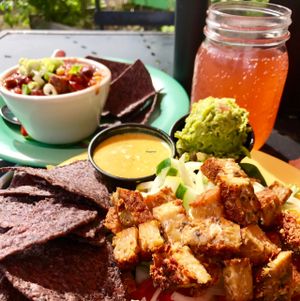 Honey Mustard tempeh bowl, chili and kombucha  at Dandelion Community Cafe in Orlando