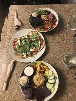 Up - Mediterranean bowl with hummus & chips on the side - BBQ Cauliflower Flatbread - Chickpea of the Sea blowl with hummus & chips on the side.  at Dandelion Community Cafe in Orlando