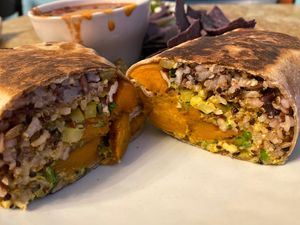 Sweet potato burrito with chili 🥰 at Dandelion Community Cafe in Orlando