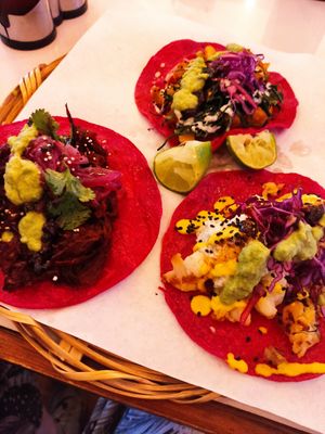 Coliflor con requesón, papas al curry and Jamaica pibil at La Pitahaya Vegana in Mexico City