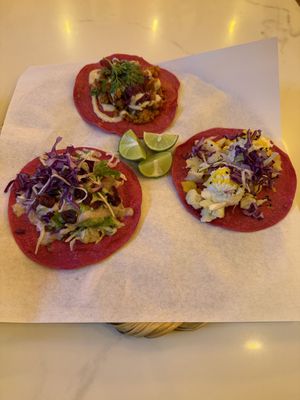 Crudi (bottom left), Camote Al Pesto (top center), Couliflor Con Requesón de Coco (bottom right)  at La Pitahaya Vegana in Mexico City