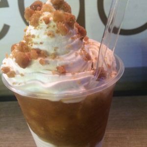 Banana topped with vegan chantilly at Veganosp in Sao Paulo