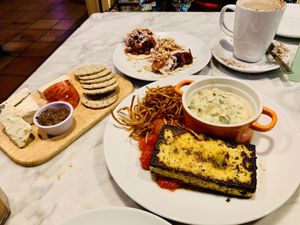 Cheese board, tacos and tofu steak at Cafe Van Gogh in South West London