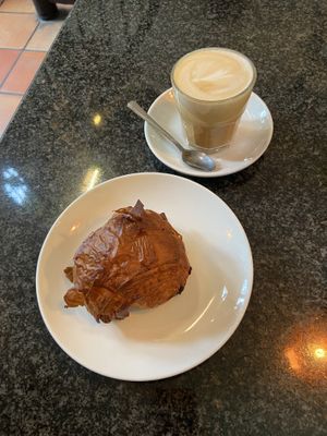 Pain au chocolat and latte  at Cafe Van Gogh in South West London