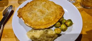 Mushroom and tofu pie with celeriac mash and sprouts at Cafe Van Gogh in South West London