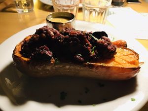 Huge stuffed butternut squash with nuts and mushrooms ! at Cafe Van Gogh in South West London