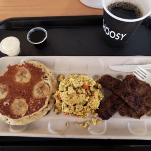 Flute Free Pancake w/ banana, tofu scramble, tempeh bacon, and soy sausage  at Choices Cafe in Miami