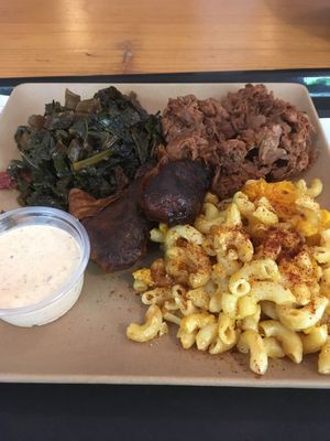 BBQ tray with drumsticks, mac n cheese, and collard greens at Choices Cafe in Miami