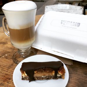 A snickers bar and a delicious cappuccino prepared right at Vegamo Centro in Mexico City