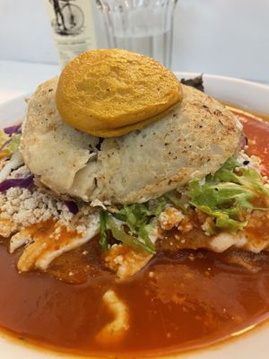 Red enchiladas with a “fried egg"  at Vegamo Centro in Mexico City