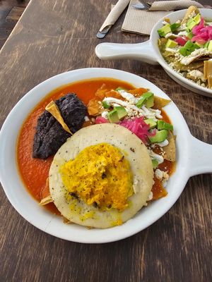 Chilaquiles rojos, con extra de tofu estrellado at Vegamo Centro in Mexico City