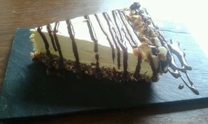 Raw Vegan Cheesecake made from cashews and cardamom with chocolate topping at Vegamo Centro in Mexico City