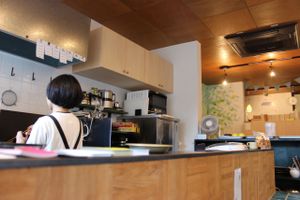 Solum Cafe: the chef prepares the food behind the counter as you watch! at Solum Cafe in Kyoto