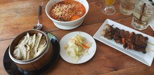 BBQ mushrooms 🍄 , noodle soup 🍜 , dumplings 🥟 at Vitking House II in Siem Reap