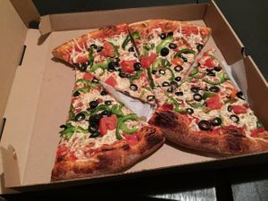 Four vegan slices at Norbert's Pizza - Flushing Ave in Brooklyn