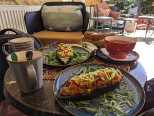 Aubergine bayıldı, tomato soup and fresh mint and lemon tea at Dit e Nat in Pristina