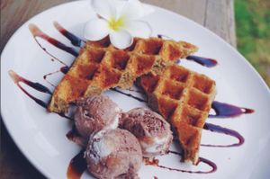 Chuffle (Churro waffle), with vegan coconut ice cream.  at Plernpai Vegetarian Cafe in Mae Hong Son