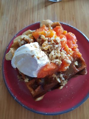 Waffle with walnuts and papaya. at Juicy Brew - Kaimuki in Honolulu