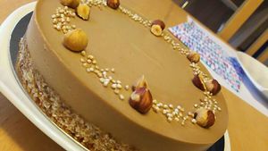 Moka cake with hazelnut base (the creamy part was great, the base not so much; too nutty and falling apart). at La Grainerie in Brussels