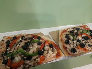 Vegan pizza slice x 2 at Hand Go in Porto