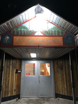 Entrance is off the alley side of the building. Lots of parking out back.  at Taj Mahal in Calgary